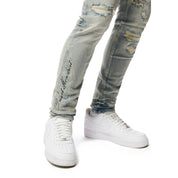 Smoke Rise Preppy Crest Embroidered Slim Tapered Denim Jeans - Cascade Blue